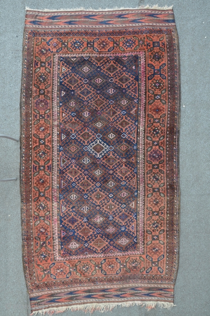 Baluch 238 x 125 cm, worn, but still loveable and ready to put on the floor.                 