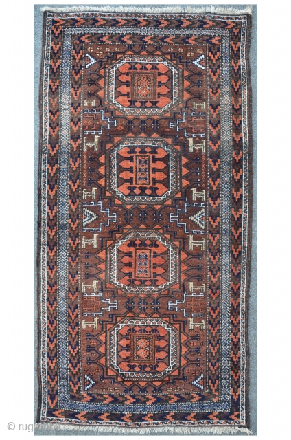 Aubergine ground Baluch, 176 x 88 cm, Twelfe animals with symbolized tits, heavy corroded black.                  