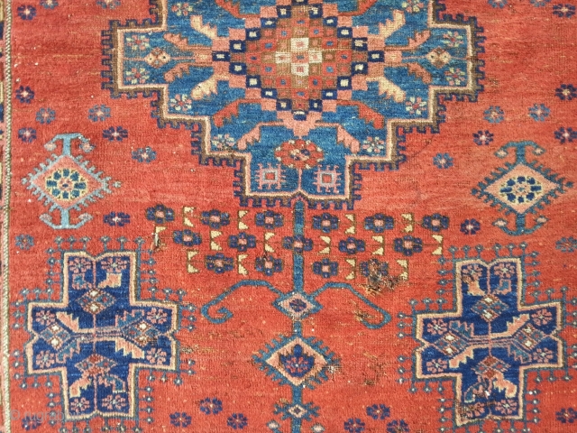 Afshar with beautyful apricot and lightblue color, 139 x 170 cm. some small holes and moth damages. 19th c.              