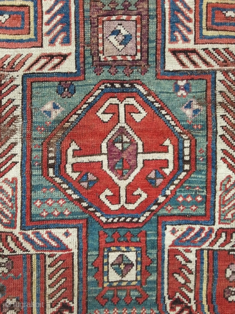 Caucasian Shirwan, 19th c. ca, 113 x 207 cm, with many lovely homemade repairs on sides and ends, nice colors.             