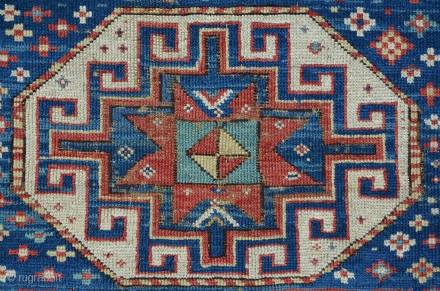 Antique Caucasian Kasak, 222 x 104 cm, three octagon medaillons with powerful memling guls on a star field....magic! Brilliant colors including a beautiful turquoise.         