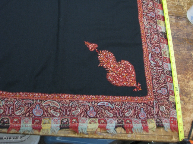 Black ground assembled Kashmiri embroidery. 65"x65"  The boteh in the corners are appliqued to a twill woven wool cloth.  Fine and lustrous, but I hesitate to call it "pashmina". I  ...