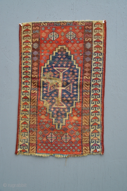 Early Armenian Yastik fragment with great colors including insect cochineal and apricot dyes. 18 x 28 inches.                