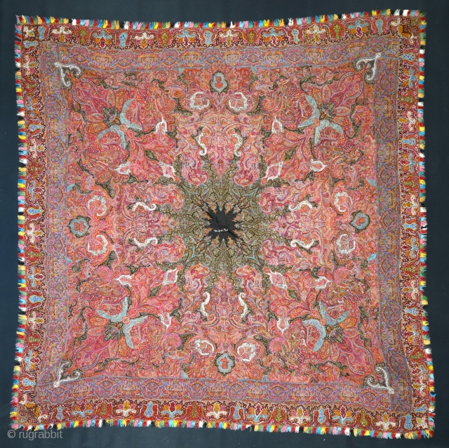 a Very fine XIXth C. Kashmir Shawl in pristine condition. Full color spectrum, including at least two aubergine purples, several reds, apricot, several greens, etc. Approx 70 x 70 inches.   