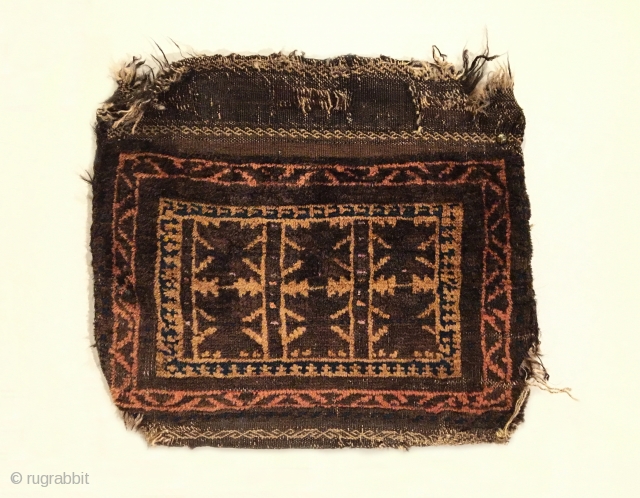 Old Timuri Baluch Bag. Circa Antique. Bits of silk between center leaves. All original sides. Soft, lustrous wool. Goat hair selvage. 5 colors. 1’2” x 1’4”. Delicately hand washed.    