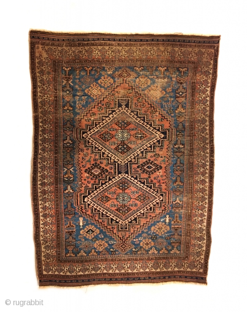 Early Afshar Rug. 2nd Half 19th Century. Two stepped medallions enclose bird head diamonds. In visiting this rug note the saturated colors: Rare light blue, strong green and a rose madder field.  ...