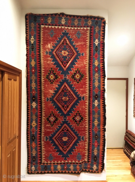 Antique Caucasian Kilim.  Dated 1904.  Second date of remembrance, 1936.  Truly tribal.  Original four sides.  10 colors.  9’ 6" x 4’ 3".  Delicately hand washed. 