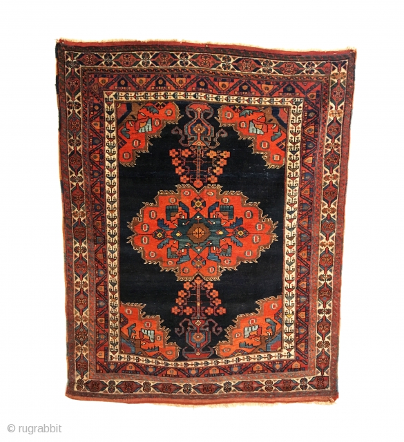 Antique Afshar Rug. Last Quarter 19th Century. Classic vase design. On the dark indigo field sit two opposing flower filled vases at top and bottom. Great condition. Original four sides. Kilim ends.  ...