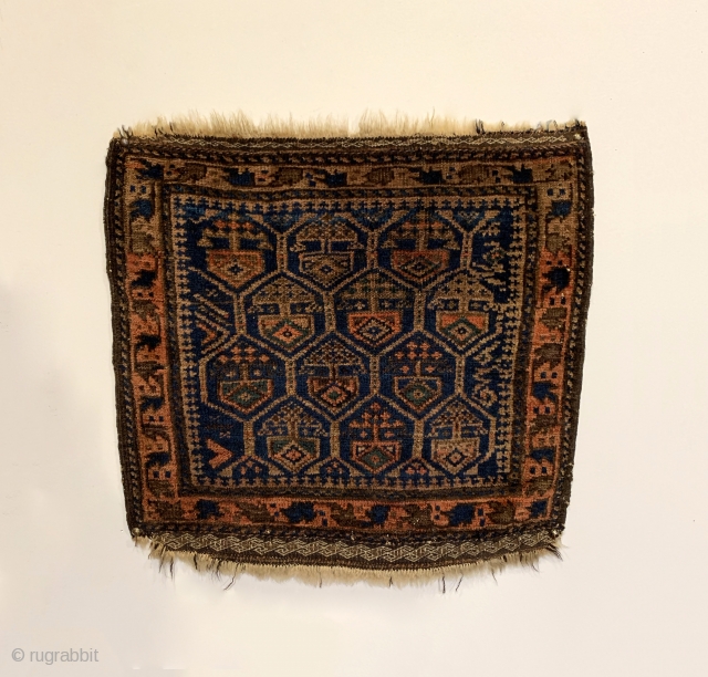 Antique Timuri Baluch Bagface. 3rd Quarter 19th Century. Dokhtar-I Ghazi honey comb design. Saturated colors including a nice green. Very good condition. Original four sides and no repairs. 6 colors. 1'8" x  ...