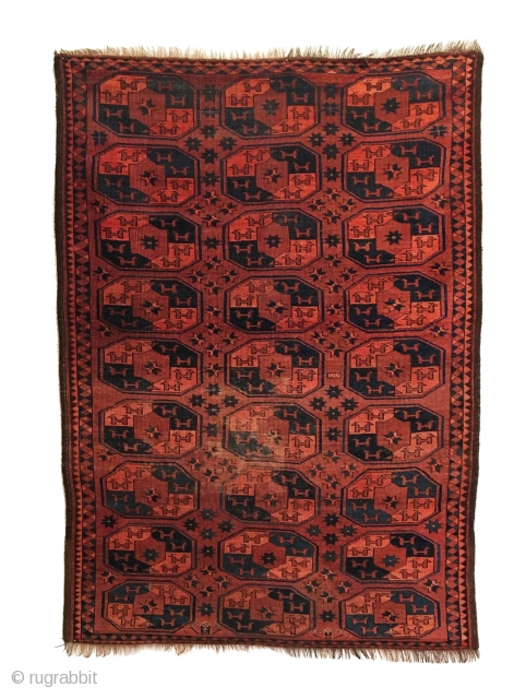 Antique Ersari small main carpet. Early 19th Century. This carpet features a 3x9 gol format ‘tauk-noska’ horned animal heads look in opposing directions. Secondary guls are in the form of star trees  ...