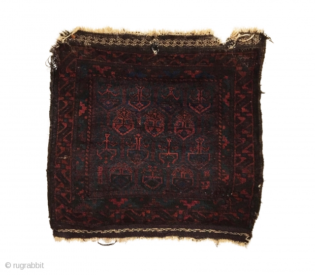 Antique Timuri Baluch Bag Face. 1st Quarter 20th Century. Hexagonal medallion enclose tree motifs floating on dark green.  Original selvage. Soft lustrous wool. 5 colors. 2’1 x 2’1. Carefully hand washed. 