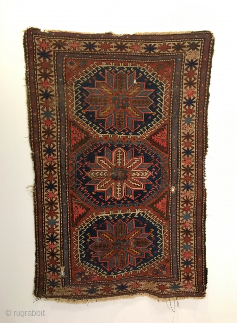 Caucasian Rug.  Circa Antique.  7 colors.  60 x 40.  3 small holes.  Minor losses to edges.  Clean and hand washed.       