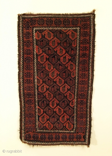 Small Baluch Rug.  Last Quarter 19th Century.  Diagonal rows of curled bird botehs on oxidized black field.  Condition: Very good.  Shiny, soft wool.  Full pile.  Original  ...