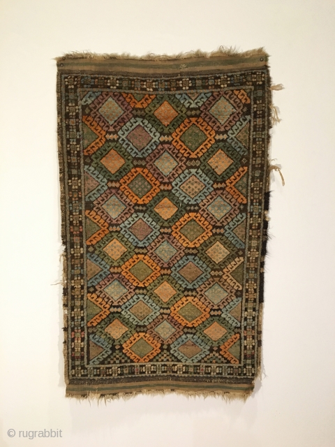 Antique Small Baluch Rug. Kurd. Last Quarter 19th Century. Jaf Kurd like saturated soft silky wool. The right balance of brown corrosion outlines colorful bird head diamonds. Original kilim ends. Excellent condition  ...