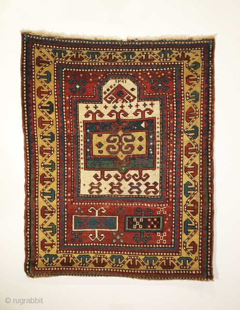 Early Tribal Kazak Prayer Rug. Inscribed Date 1261 = Circa 1845. Very good condition considering age with even wear. No repairs. 7 saturated colors. 2’2 x 3’11. Delicately hand washed.

Note the large  ...