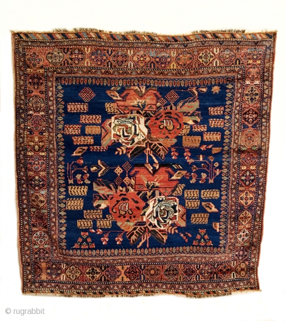 Antique Afshar Rug. 2nd Half 19th Century. Royal blue field with a central ‘Gul Farang’ design flanked by bunches of stylized blossoming branches and meandering outer vine, all within a terra-cotta cusped,  ...