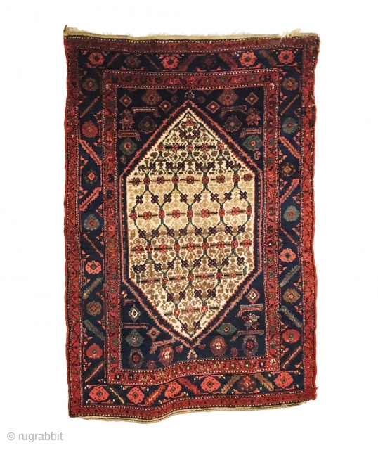 Antique Kurdish Rug 4'2 x 6'3

Antique Kolyai Kurdish rug with an ivory honeycomb lattice field design with Herati type motif filling corner spandrels. Featuring a beautiful flower and leaf border and meandering  ...