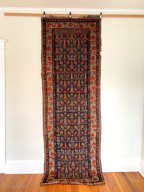 Antique Caucasian Karabagh Runner. SE Caucasus. Last Quarter 19th Century. Three rows of tree shrub forms surrounded by striking angled botehs on deep blue field. Beautiful repeating colorful blossomed flower border. 8  ...