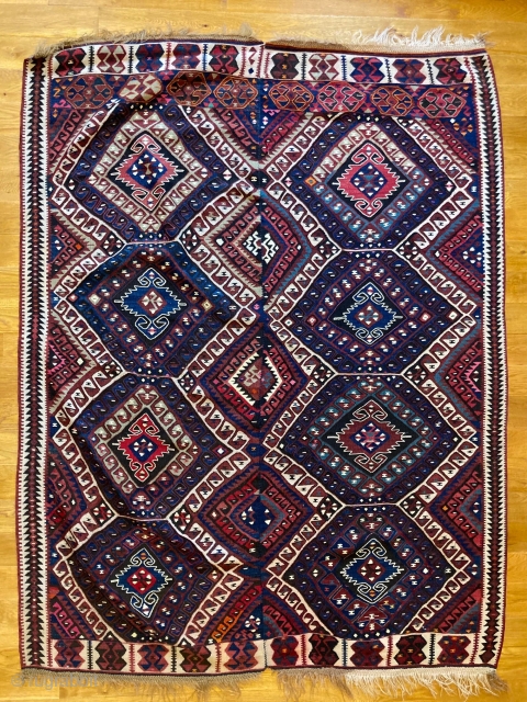 7'1" x 5'5" Van Anatolian Tribal Kilim [015]

Beautiful one-of-a-kind Van Anatolian kilim. Woven in two parts on a narrow loom, then joined together at the center. A brilliant 8 colors, preserved from  ...