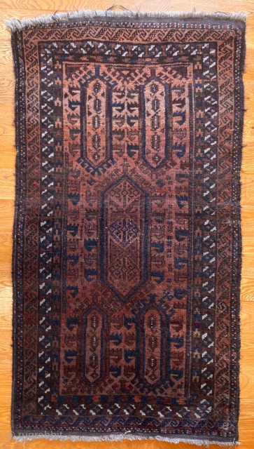 4'9" x 2'7" Baluch Rug [096]

Antique Baluch rug. Powerful birds head medallions with an S-border, and a rich red turning to a copper. Kilim ends, with a two cord selvedge, six colors,  ...