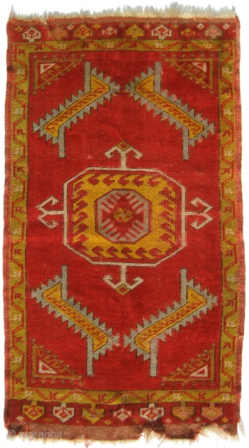Anatolian Mat or Bag Face, 20th Century, 1'8" x 3'0". Wool pile on wool foundation; 88 Turkish knots per square inch (8 x 11); Low, even pile; Minor foundation visible; Original side  ...