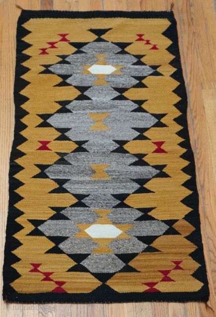 Gorgeous Antique Navajo hand woven wool rug, it measures 2'5" x 4'6" ft. great condition, colors are gold, gray, black, red, white, professionally hand washed recently.