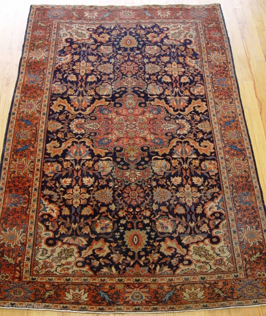 Persian Farahan Sarouk Rug circa 1880 the size 4'5" x 6'8" original good condition, has low pile throughout the rug , blue background, hand washed and cleaned professionally ready for your home  ...