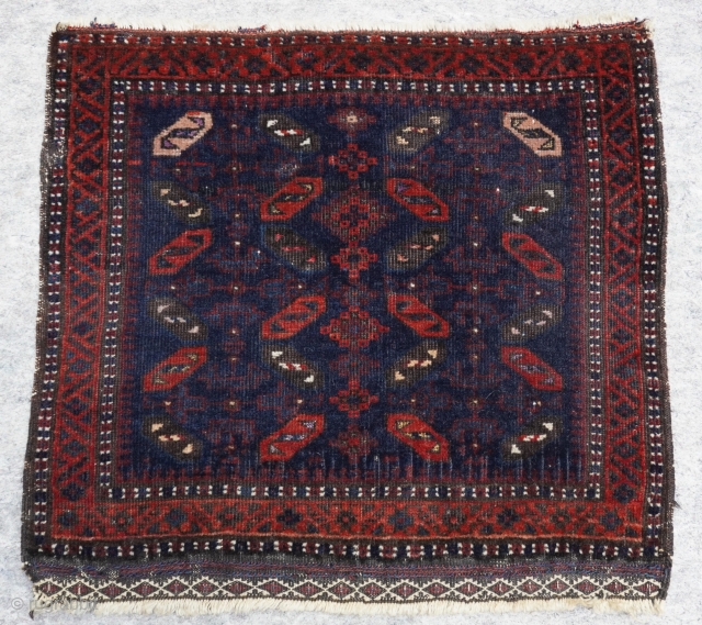 Antique Baluch Saddle bag face, ca.1870s, size is (1'9" x 1'8" ft) (53 x 52 cm.) tightly woven.               