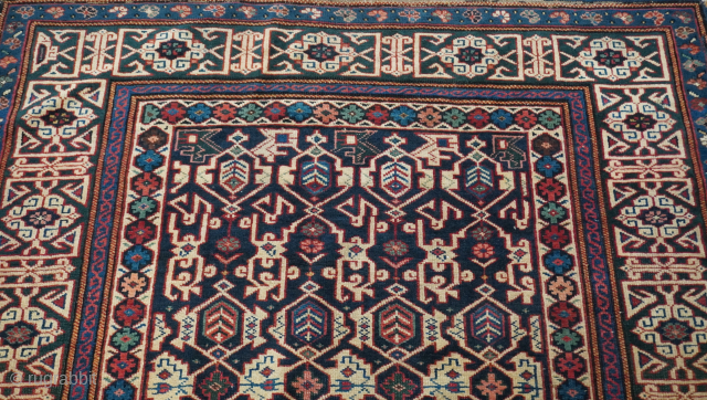 Antique Caucasian Konagkend Kuba rug with green border background and indigo blue filed, size 4' x 5'10" ft. circa 19th century.
email: thetriballooms@yahoo.com           