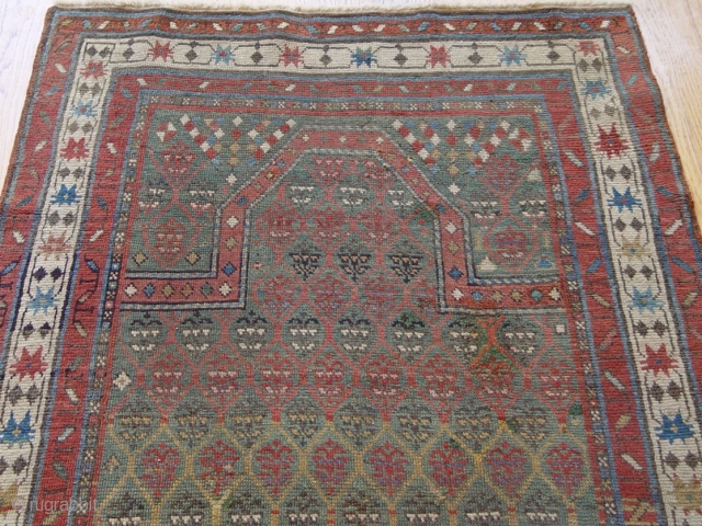 Antique Caucasian Karabagh prayer rug, size 2.11 x 4.11 ft.(59 x 119 cm), 100 % wool, beautiful green background.              