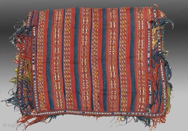 Uzbek Horse Cover, Central Asia, late 19th century, 4’3”x 3’8”

This flatwoven horse cover was made in Central Asia by Uzbek weavers.  It is composed of narrow bands of warp faced technique  ...