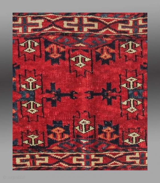 Yomut Group Torba, Central Asia, circa 1900 or before(?), 2'11" x 1'4"

Asymmetric knot open right

Cotton weft (white with some blue)

Good condition, no repair, complete with hanging cords and flat woven back

Saturated clear  ...