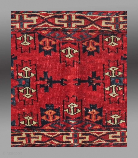 Yomut Group Torba, Central Asia, circa 1900 or before(?), 2'11" x 1'4"

Asymmetric knot open right

Cotton weft (white with some blue)

Good condition, no repair, complete with hanging cords and flat woven back

Saturated clear  ...