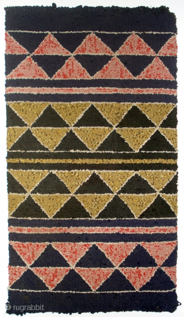 American Hooked Rug
With a few minor areas of distress,this is an interesting geometric composition. Distress includes wear on the upper right corner and a few pile loops that have come loose. Circa  ...