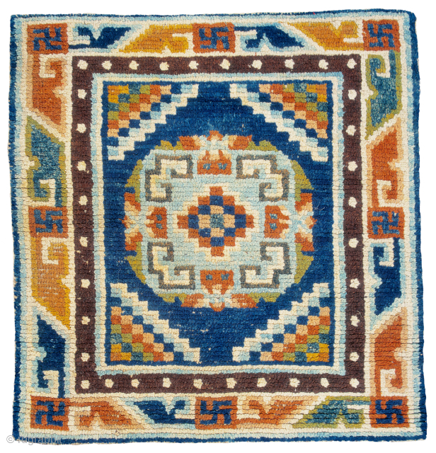 Tibetan seating carpet. great color. Great border
late 19th/early 20th Century
Tibet

contact: tmond@hotmail.com                      