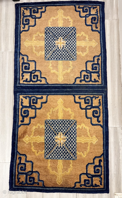 Nyingxia mat. An unusual rendering of the classical double Dorje motif overlayed with a geometric device that may be suggestive of Dragon scales. Lovely wool. Overcast edges
31 x 63 inches
19th century
China

please contact  ...