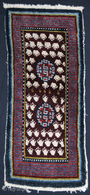 Gorgeous little Tibetan saddle carpet!!!
20 x 46 inches
Great color. Great wool. An unusual variation of the warp-faced back weave.
              