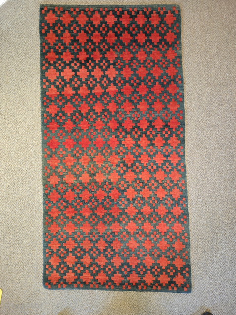 A very nice stepped-cross Khaden. This sleeping carpet was illustrated on the cover of the Woven Jewels Catalogue of the Pacific Asia Museum, Pasadena, 1992. A very nice example of the type.
cotton ...