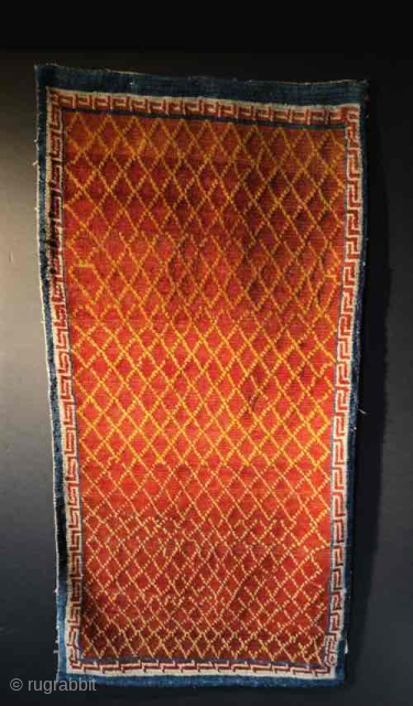 Lattice grounded Tibetan carpet. Sensational color. unusual drawing.
late 19th Century (perhaps early 20th).
contact
tmond106@gmail.com