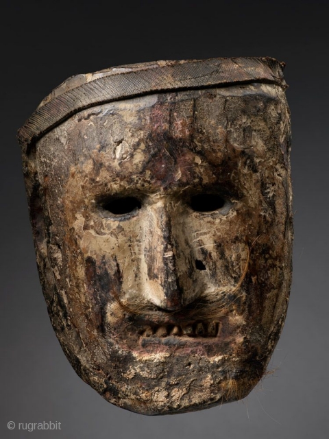 Shamanic Mask,

Middle Hills, Nepal, 

Wood, pigment, rubber strip, fur, 

18th/19th Century,

Published: Masks of Fabled Lands, 2009 plate 57,

9 in/23 cm.


A heavily patinated hardwood mask with an uncommon white-pigmented face and a mirror-like  ...