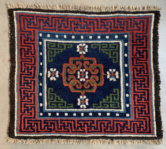 central Tibetan sitting rug (kagangma), second half 19th century, 59 x 68 cm, natural colors, good condition                