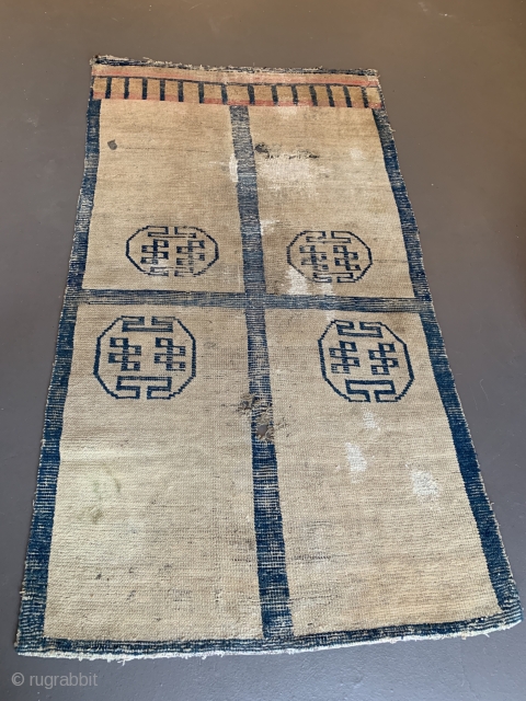 Door rug from Tibet. With some old repairs and holes.  Basically in a weak condition as you can see from the pictures. But it is the rare and early type of  ...