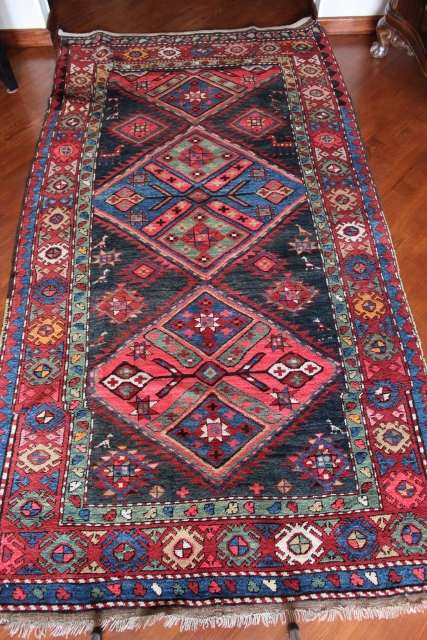 A 1930s Karabagh rug in great condition, full pile, no restorations at all, classic design with beautifully drawn borders. size: 135cm x 251cm

please ask for a shiping quote.     