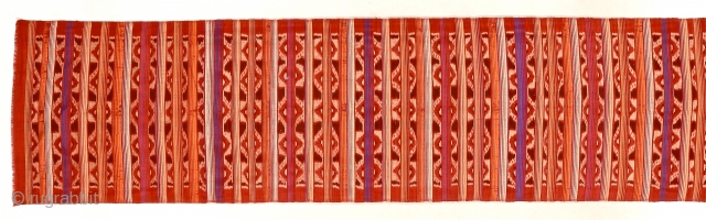 Early to mid-20th c. Three metre long silk endek/ikat woven cloth. Balinese people. Striking piece, worn as a breast cloth or waist wrap.
see.www.tinatabone.com          