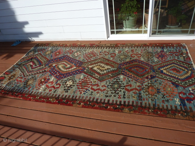 Antique Anatolian kilim about 10' x 5'   Substantial but not 100% complete--see pictures.  Rare blue ground with many interesting details. $1200 US plus shipping.      