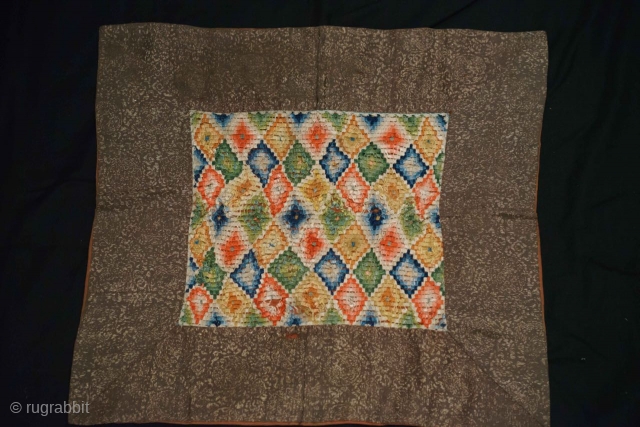 Composite textile. Ritual use (45x41 cm).
Found in Nepal-Kathmandu, in the late 1990s.
Composed of three types of textiles assembled with various stitches.
The central part of 26x23 cm is an embroidery on net, made  ...