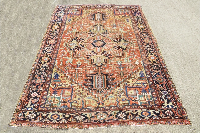 Outstanding antique Heriz rug with rare and outstanding color combination, some low areas but still very nice and decorative piece.  Size 11'-9"x9'.          