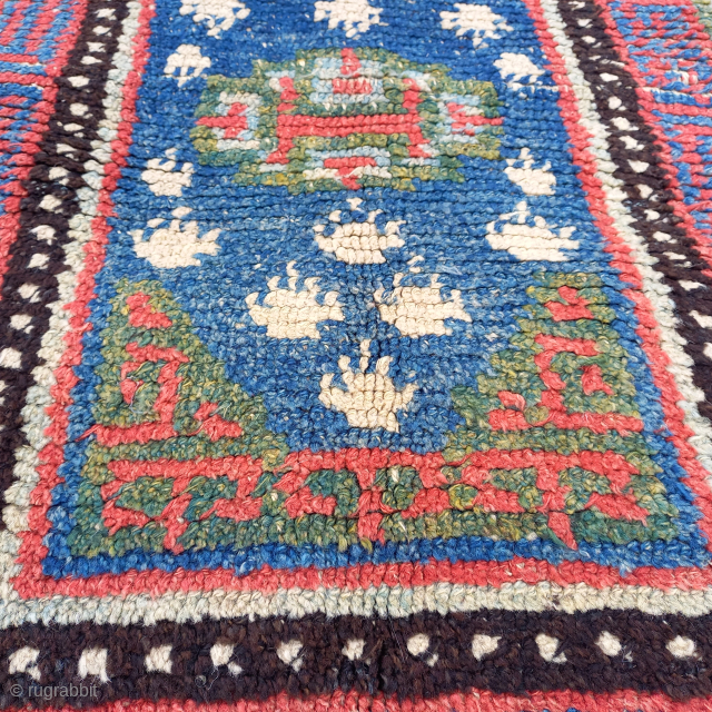 A fantastic tibetan Wangden top saddlerug.
Mid 19th century. 
All organic dyes of what I can see.
Some wear in the middle and around the edges as seen in pictures but it has been  ...