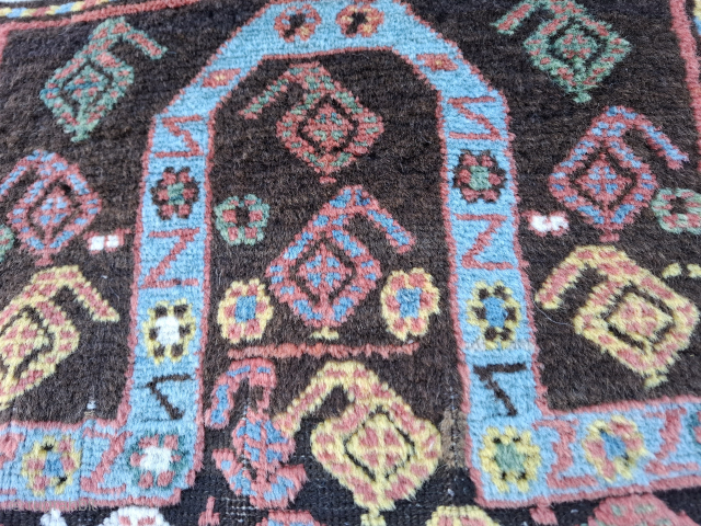 A stunning caucasian prayer rug from Dagestan area 1860-80. 
All organic dyes. 
83x148 cm
Over all very good condition. One minor repair, one cut and shut, black/brown yarn in the middlefield heavy corroded  ...