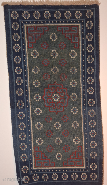 A top class tibetan Khaden from 19th century and possibly as old as 1850.
All wool and extraordinary green, red and blue. 143x73 cm.
Bought from Thomas Cole in 1990's.

A rare oppurtunity 


Not cheap  ...